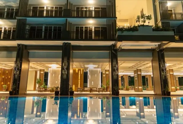 Ground-floor lounge and reflecting pool at The Oriana, Quezon City, actual photo